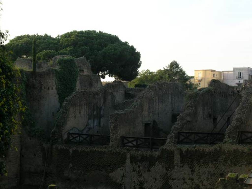 Ins Or II.10, Herculaneum, on left. December 2004.
View of Ins. Or. II.10, 11 and 13 (two rooms on right), looking west towards rear across rectangular area on west side of Palaestra portico.
Photo courtesy of Nicolas Monteix.